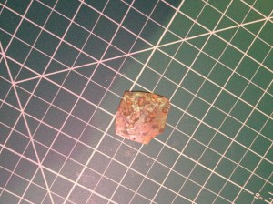 I patinaed a piece of 24 gauge copper with used cat litter. Yes, it sounds gross, but, once it is done, you can wash it and there is no trace of smell and you get a nice color. I cut out the copper to match the back of the piece. It is important to saw the copper -- if shears are used, the patina will pell off. The corner is missing because of the shape of the copper sheet I had. Since it will be hidden, it does not matter.